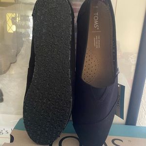 Toms. NEW W/ TAGS IN BOX.  Black.  Size 10 womens